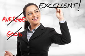 A woman writing Excellent.